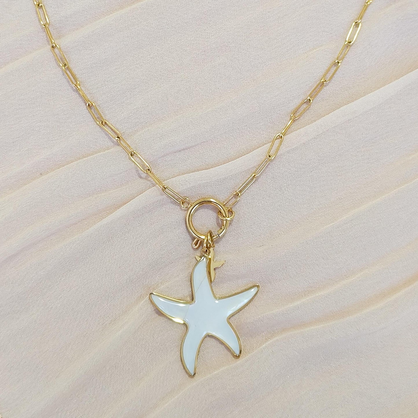 Conjunto estrella de mar blanca ( collar y anillo)