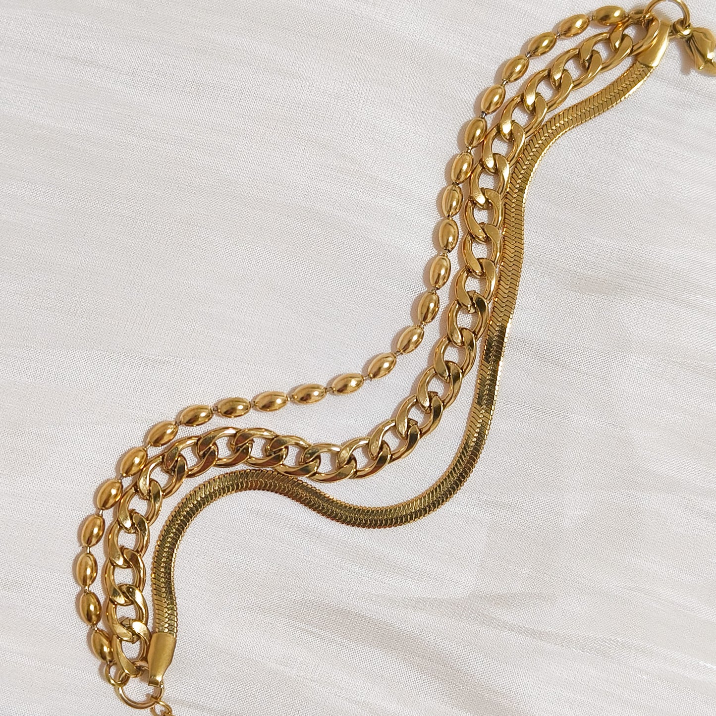 Pulsera Triple Dorada Miami ( tres cadenas)