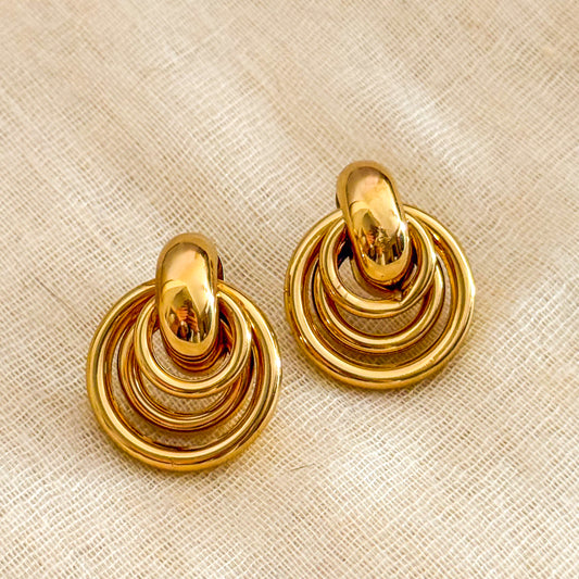 Pendientes Órbita (Aros Dorados Entrelazados Pulidos)