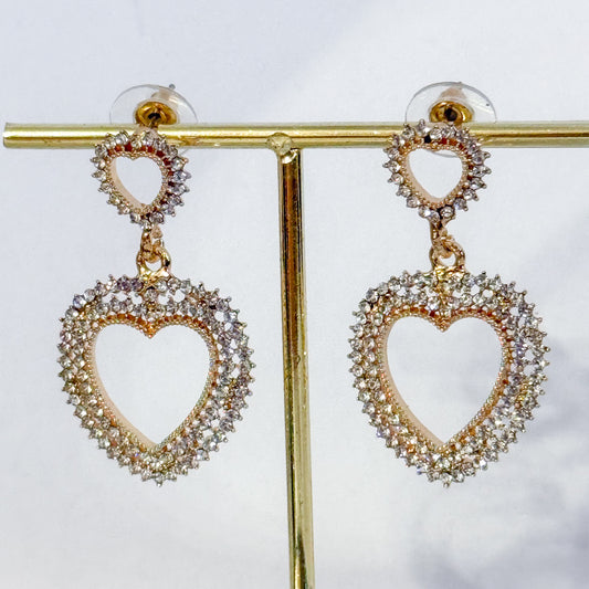 Pendientes Corazón Doble Amor (Corazones Colgantes Dorados con Cristales)
