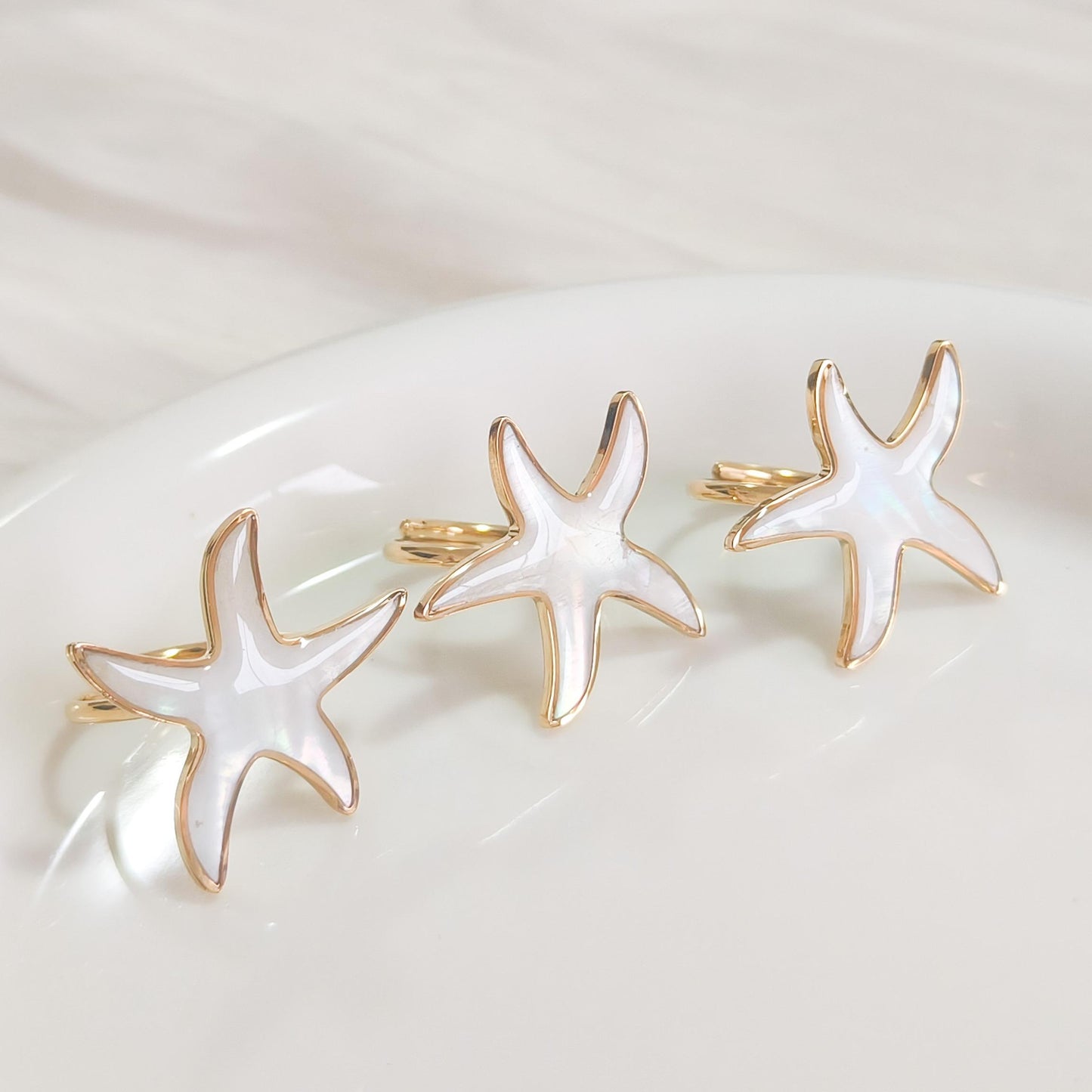 Conjunto estrella de mar blanca ( collar y anillo)