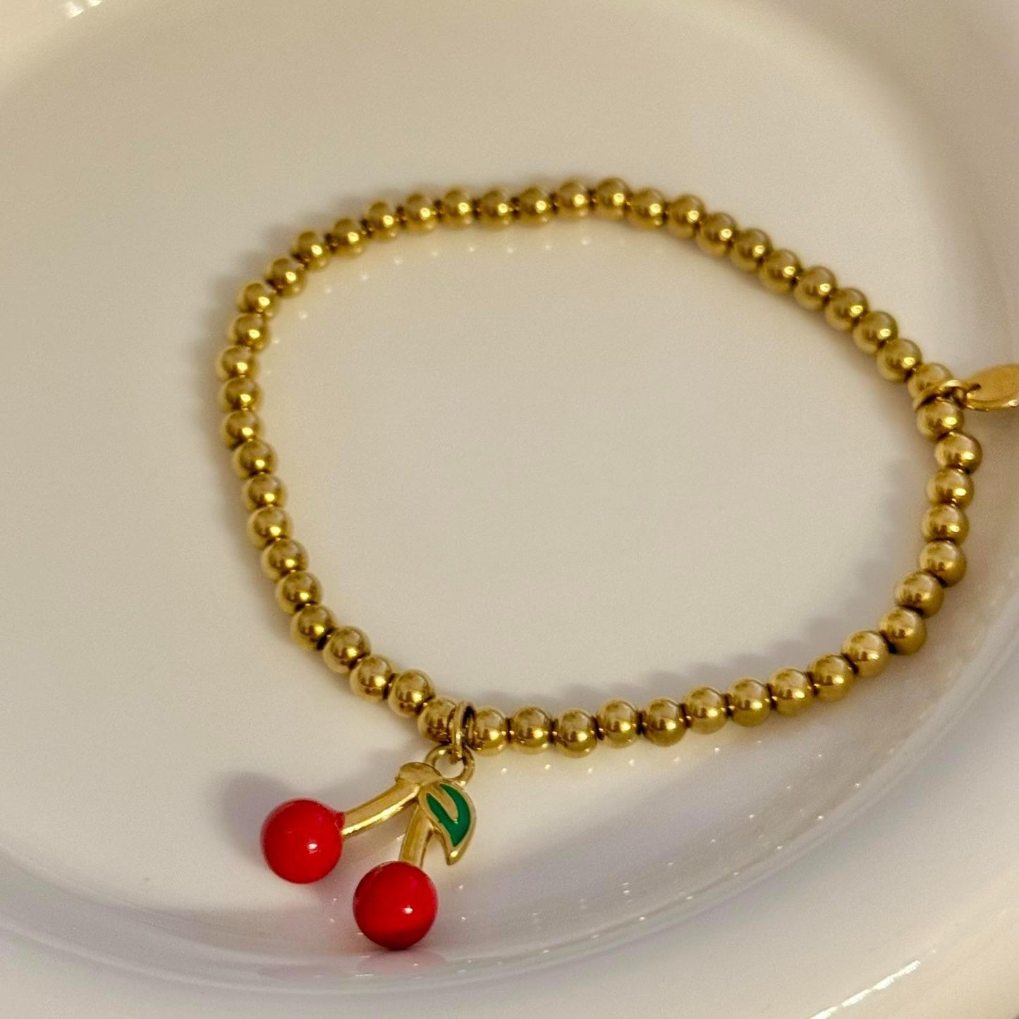 Pulsera elástica de bolitas con colgante