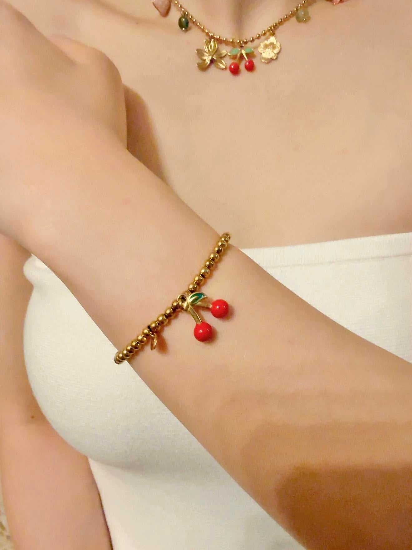 Pulsera elástica de bolitas con colgante