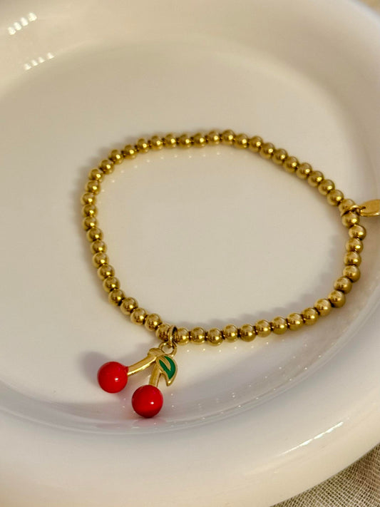 Pulsera elástica de bolitas con colgante
