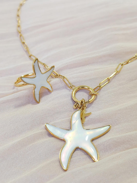 Conjunto estrella de mar blanca ( collar y anillo)
