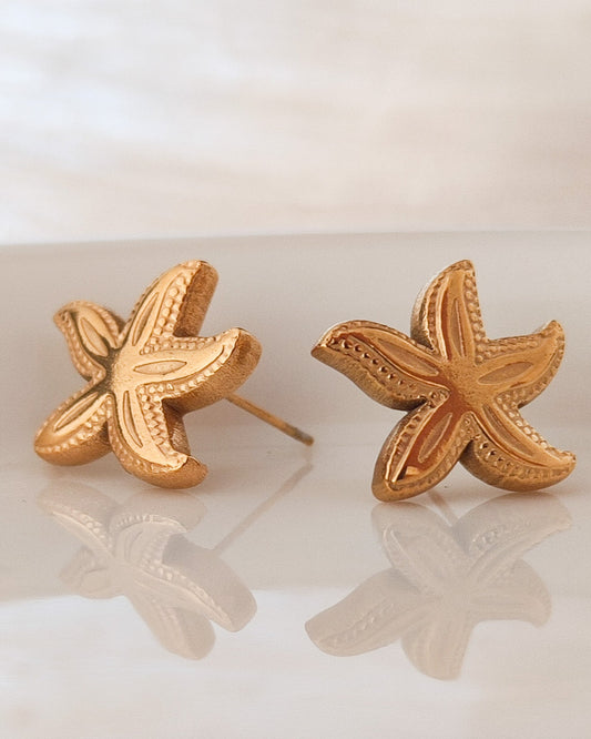 Pendiente estrella de mar pegado