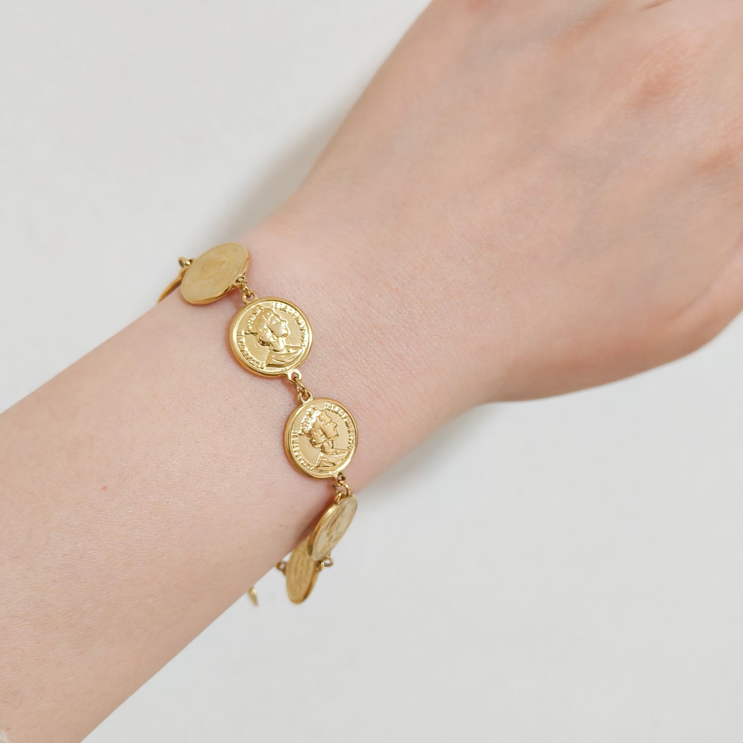 Look Moneda Roma ( pulsera pendientes anillo)
