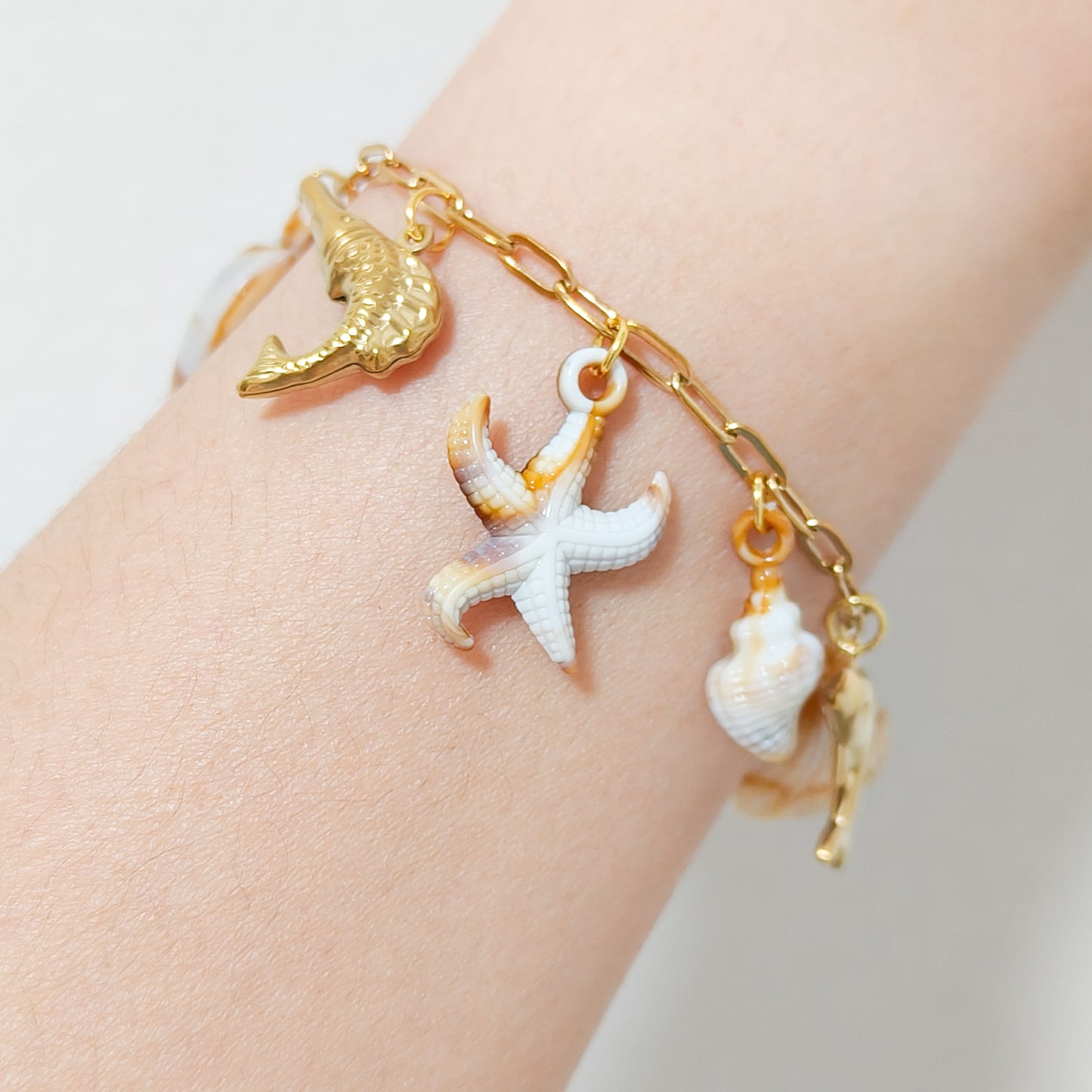 Pulsera Costa Serena Estrella ( marrón / dorado)