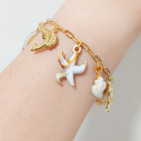 Pulsera Costa Serena Estrella ( marrón / dorado)