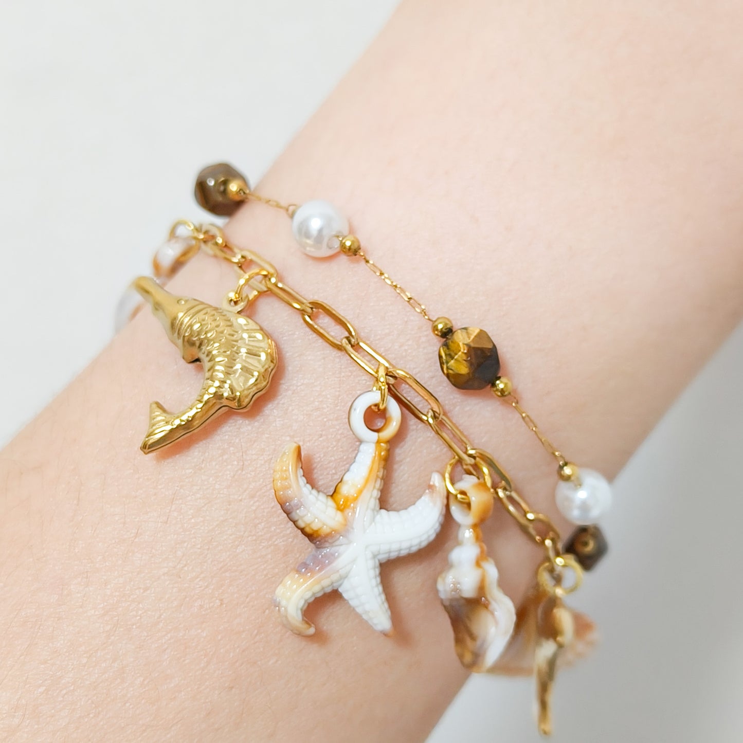 Pulsera Costa Serena Estrella ( marrón / dorado)