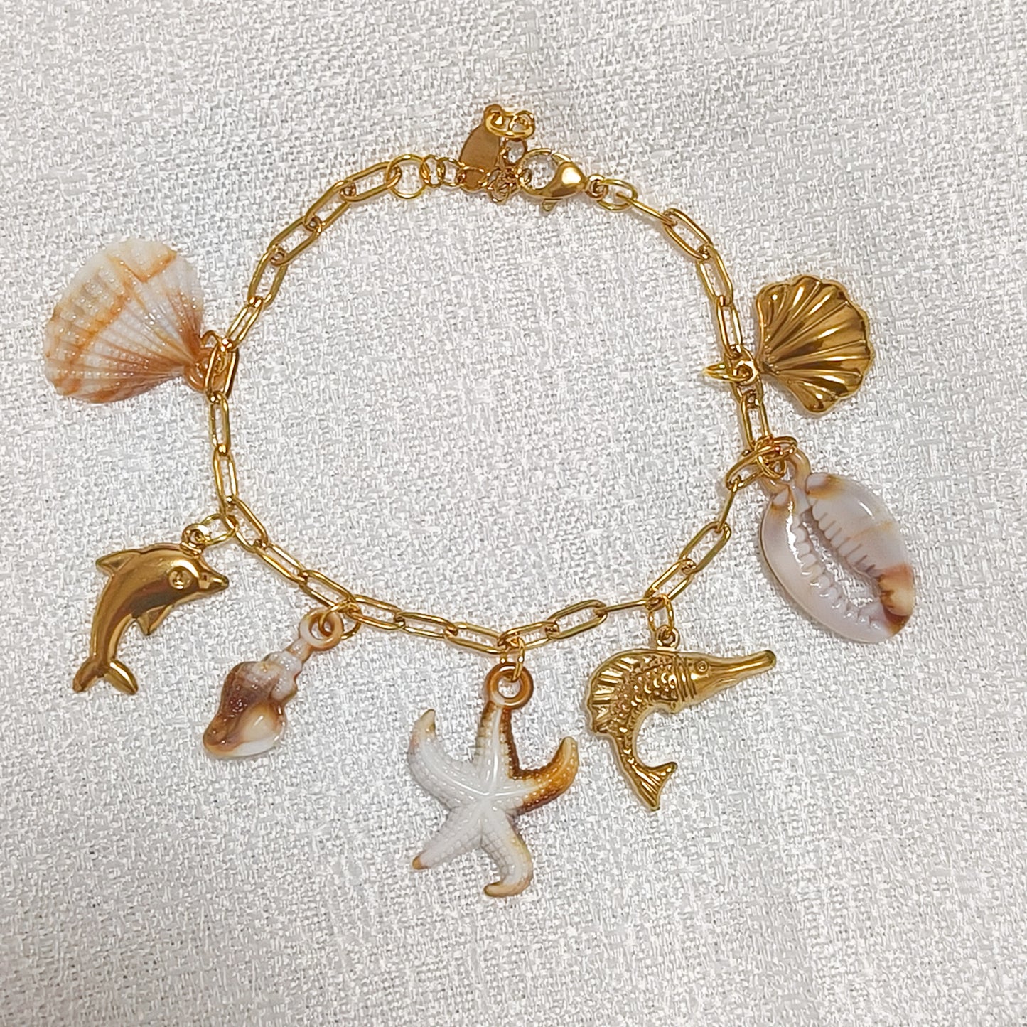 Pulsera Costa Serena Estrella ( marrón / dorado)