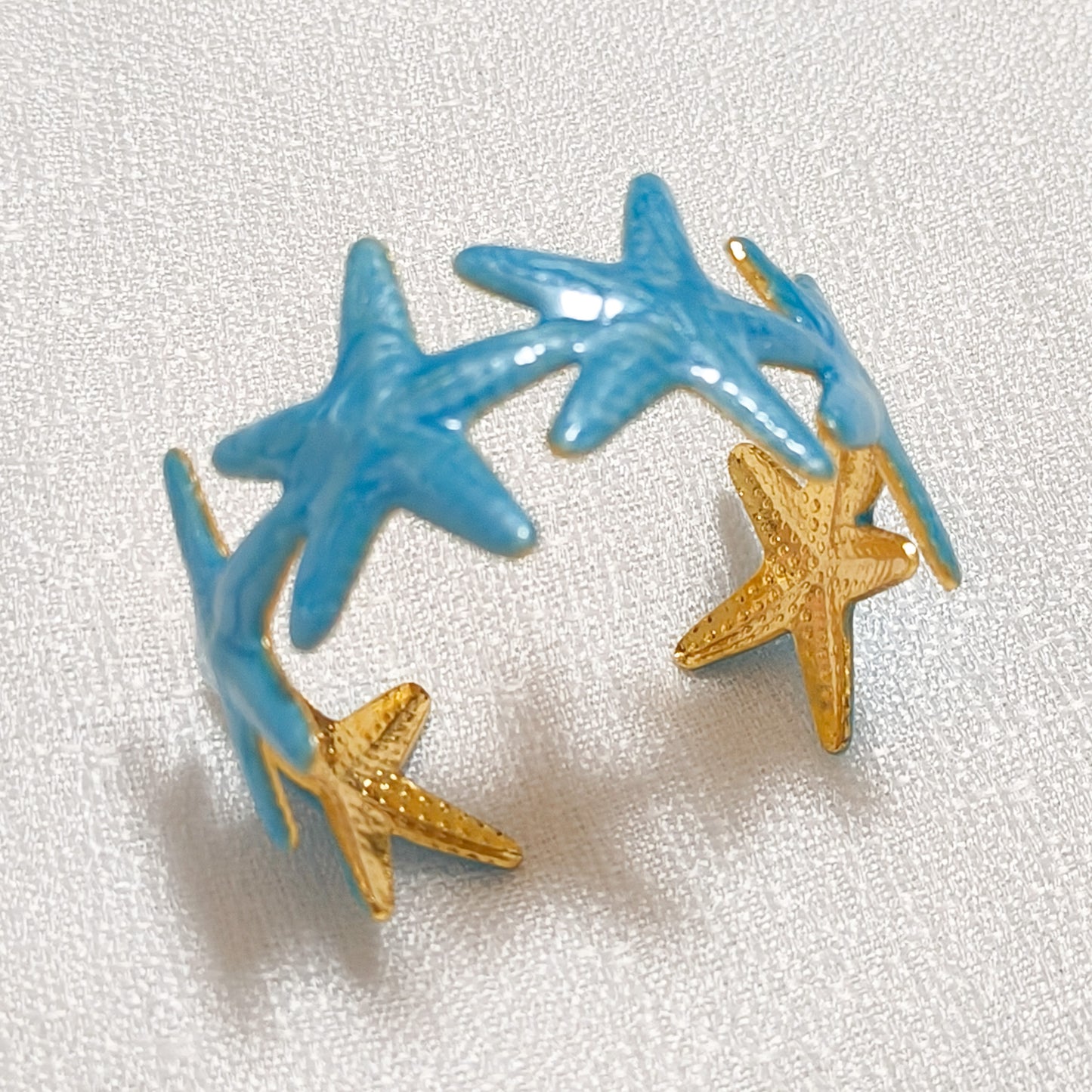 Brazalete acero ajustable Estrella de Mar Mediterránea ( 4 coloroes)