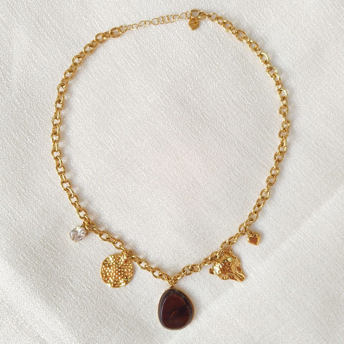 Collar Charm de Acero Alma de Siena Gota con charm de jaguar