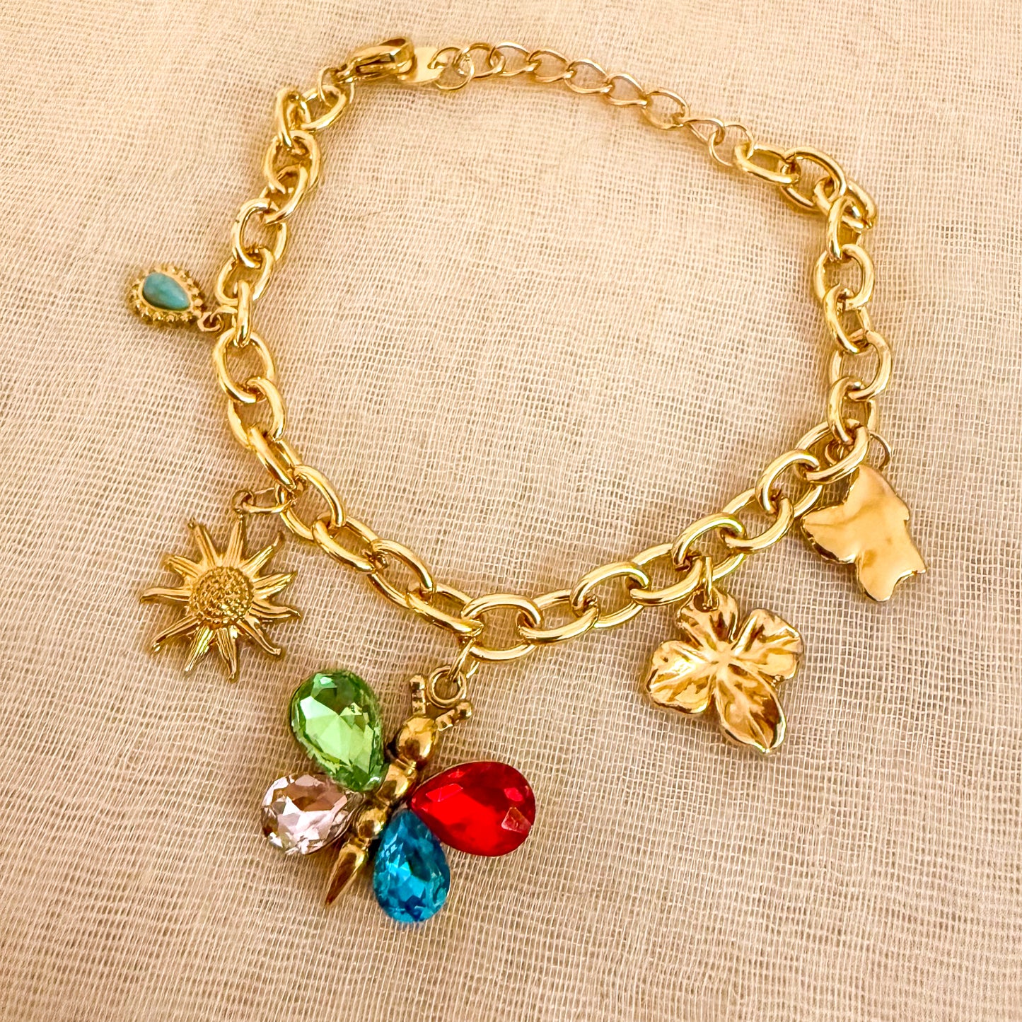 Pulsera Charms Aurora (Mariposa + Sol + Hojas)