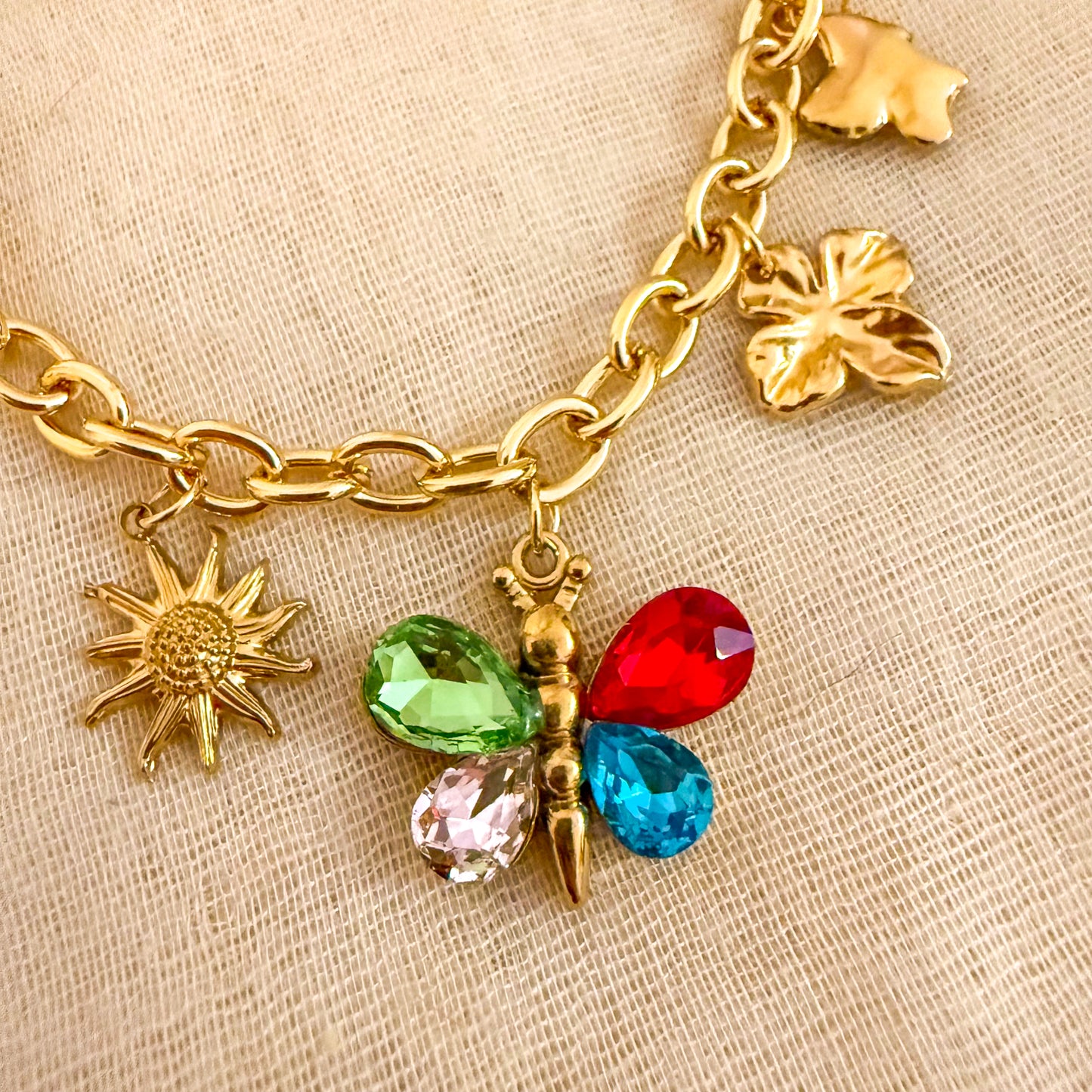 Pulsera Charms Aurora (Mariposa + Sol + Hojas)