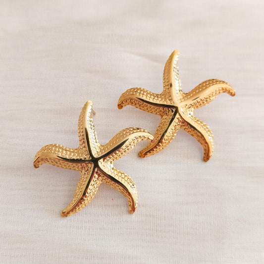 Pendientes estrella real ( puntos)