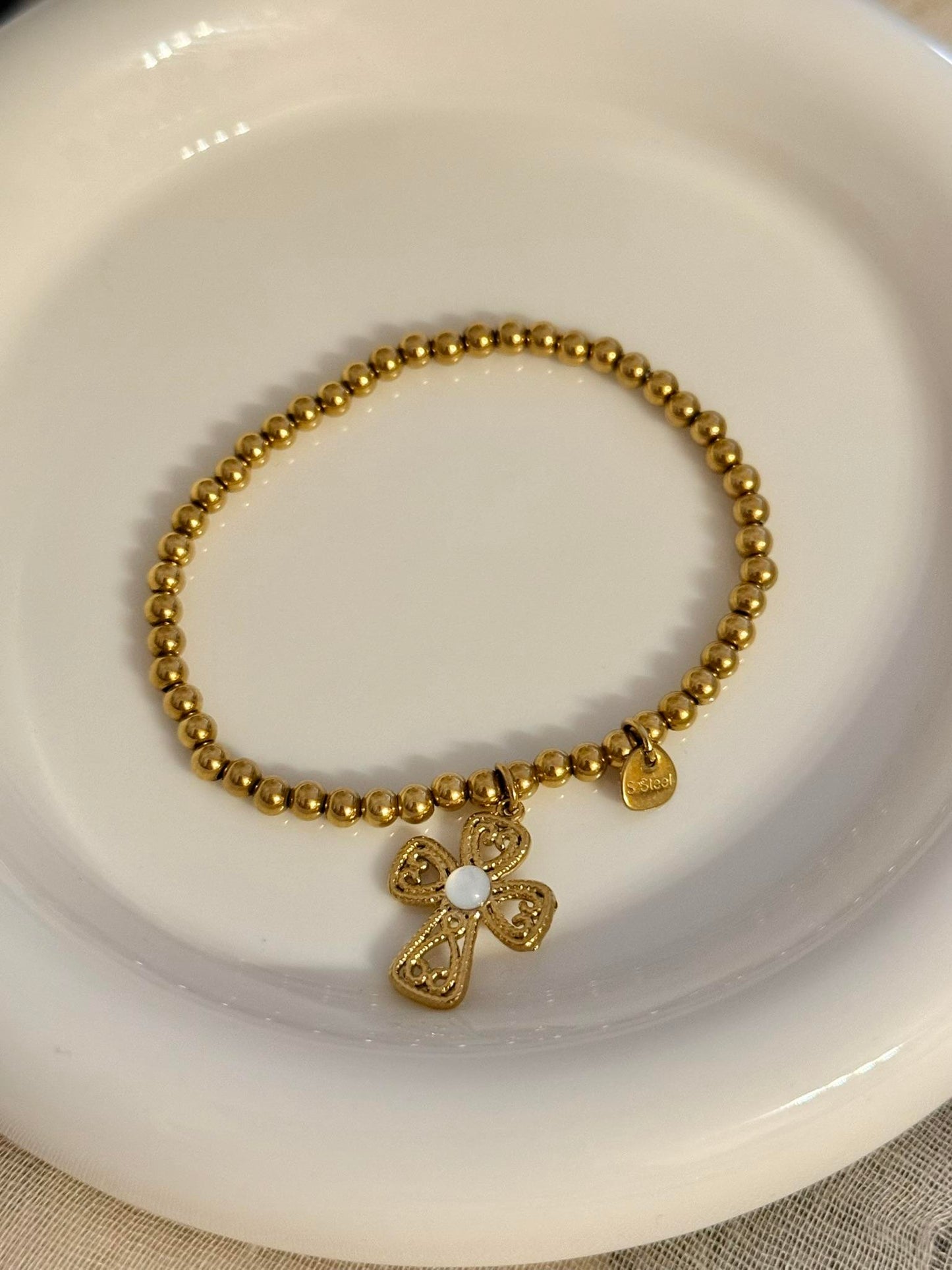 Pulsera elástica de bolitas con colgante