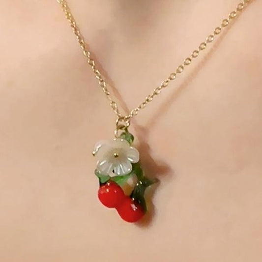Collar cereza y flor